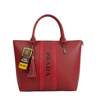 Elegant Red Structured Tote Handbag with Top Handles, Tassel Charm & Vertical Stripe Design